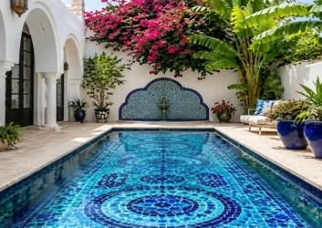 Blue mosaic medallion pattern pool courtyard Blue mosaic medallion pattern pool courtyard
