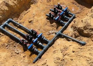 Underground irrigation valve manifold solenoids Underground irrigation valve manifold solenoids